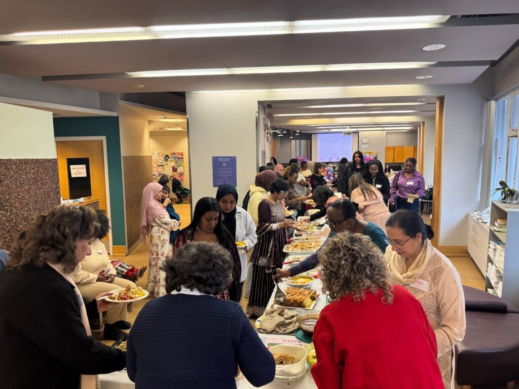 Women enjoying a buffet of food